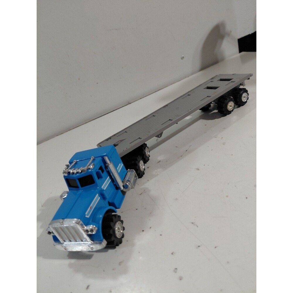 Schaper Stomper 4x4 Battery Operated Peterbilt Semi Truck w/ Flatbed Trailer